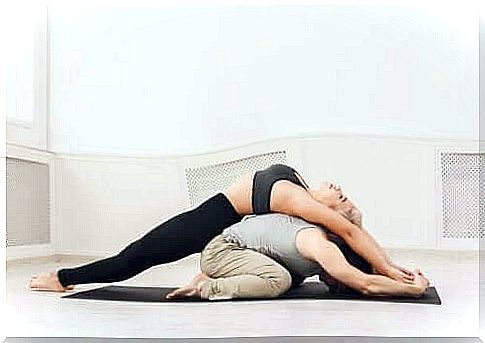 A couple doing yoga