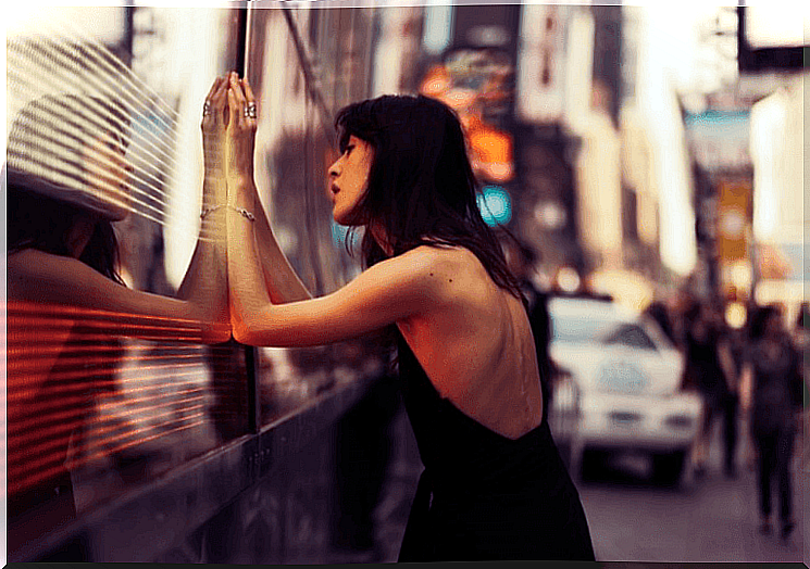 woman in front of a train 